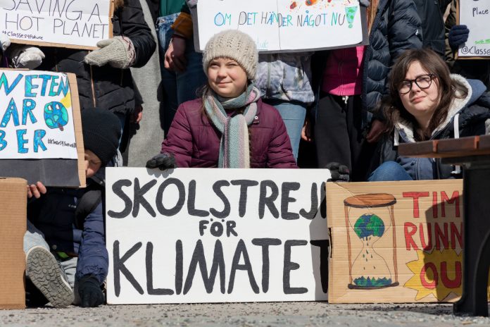 Climate activists lead by Greta Thunberg protesting in Stockholm, Sweden